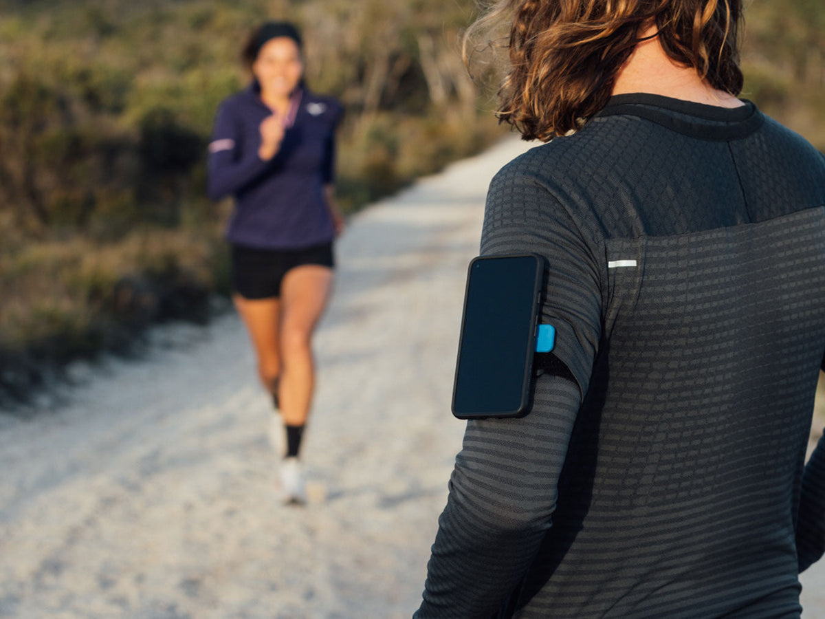 runner waiting with quad lock sports armband