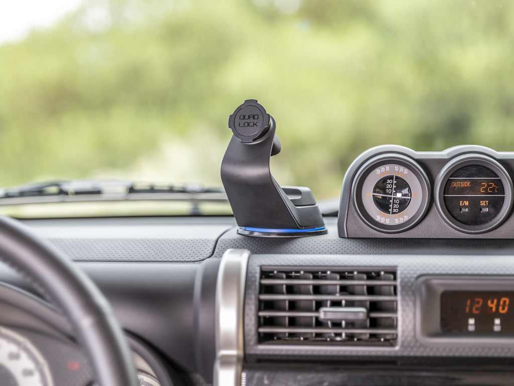 smartphone car mount on dash of car