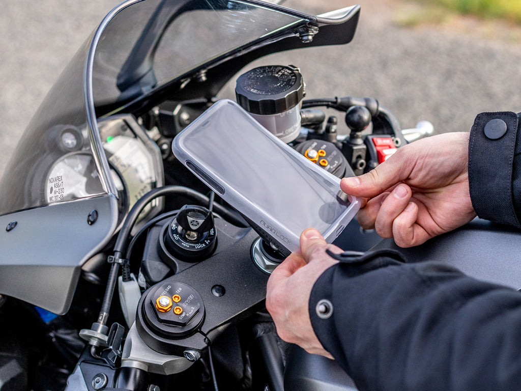 Quad Lock Fork Stem Mount with iPhone and weather resistant Poncho