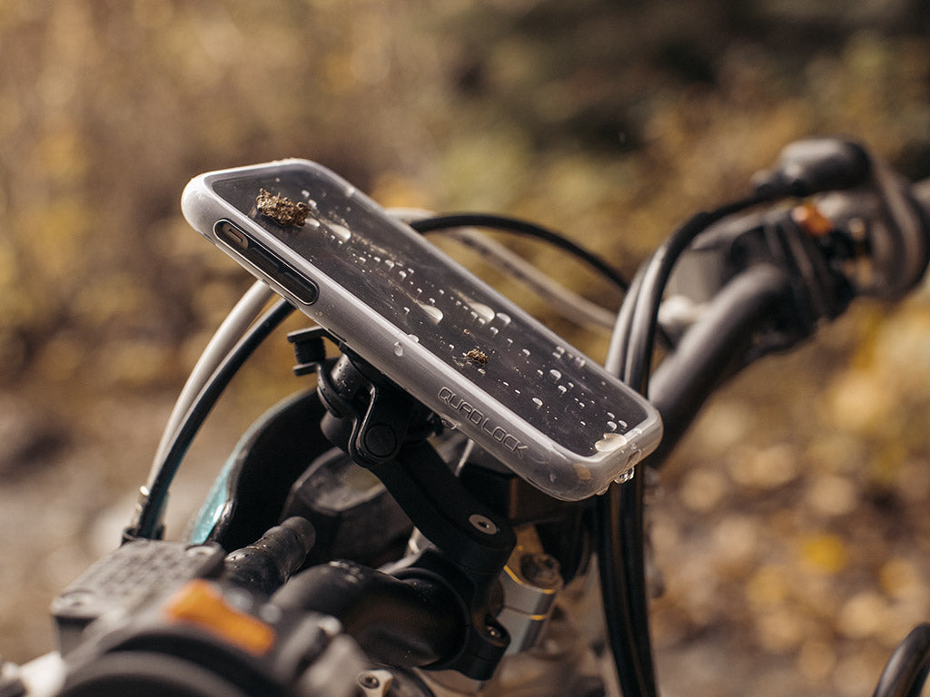 quad lock poncho on motorbike mount