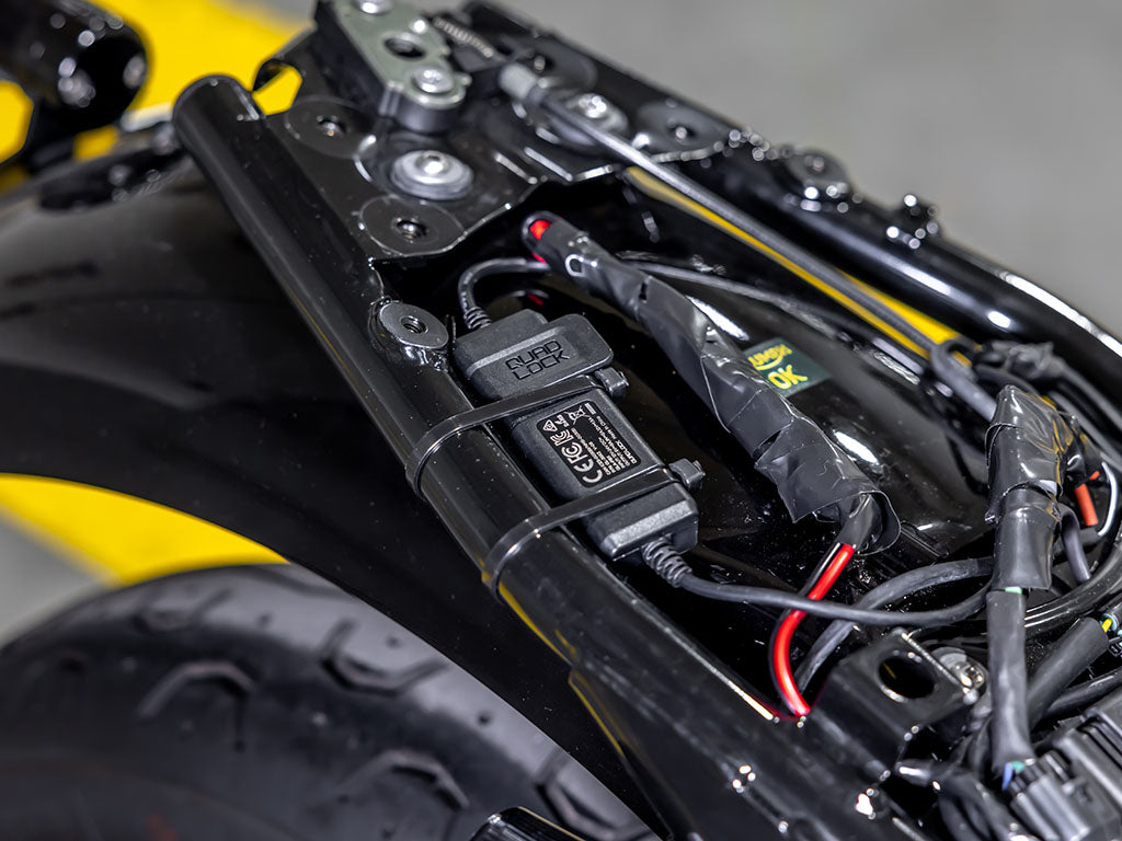 Quad Lock Waterproof 12V to USB Smart Adaptor connected to Triumph motorbike