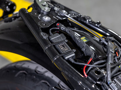 Quad Lock Waterproof 12V to USB Smart Adaptor connected to Triumph motorbike