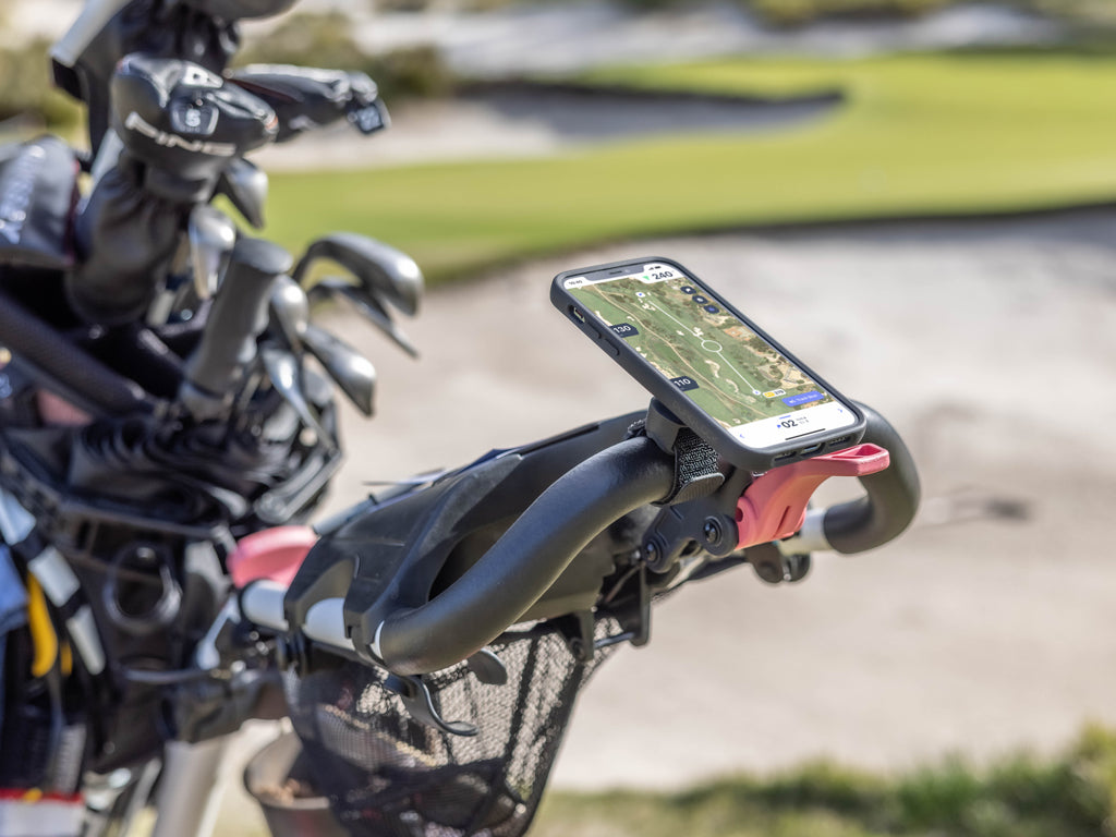 Quad Lock golf strap on cart with Hole19 App on screen